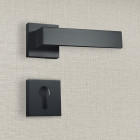Poignée de porte design à cylindre finition aspect noir mat paola - katchmee