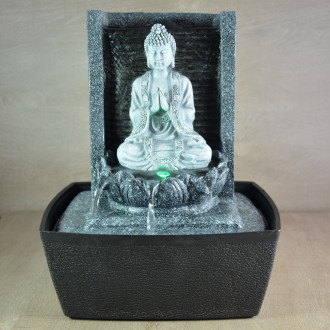 Fontaine bouddha en méditation nirvana