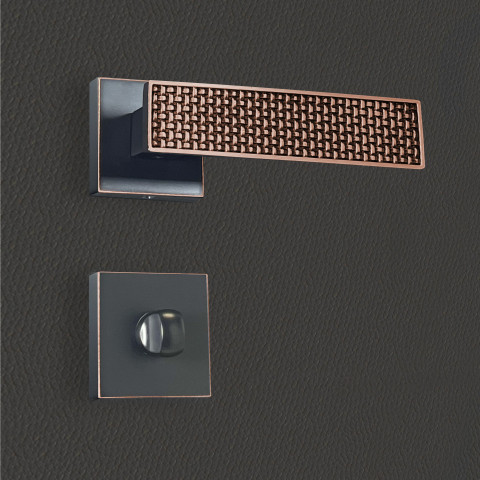 Poignée de porte design à condamnation finition aspect cuivre patiné noir amalia - katchmee