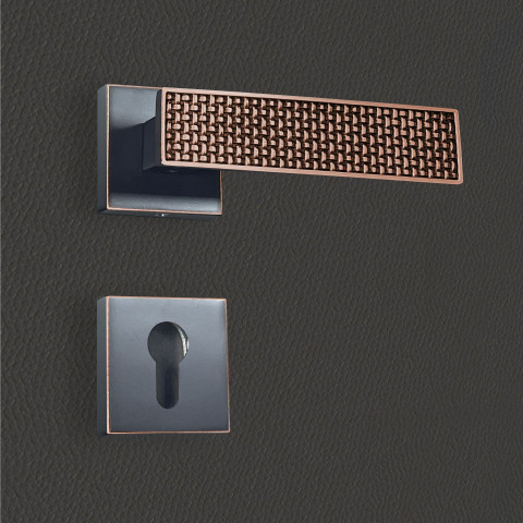 Poignée de porte design à cylindre finition aspect cuivre patiné noir amalia - katchmee