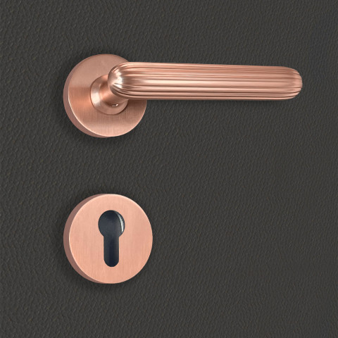 Poignée de porte design à cylindre finition aspect or rose livia - katchmee