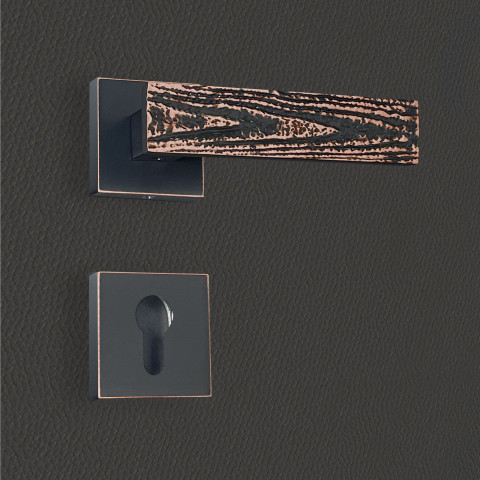 Poignée de porte design à cylindre finition aspect cuivre patiné noir flora - katchmee