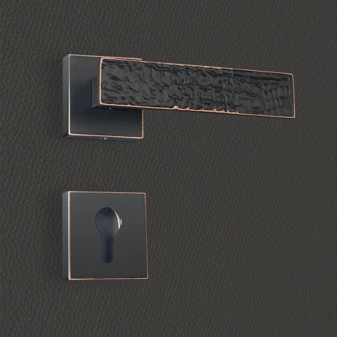 Poignée de porte design à cylindre finition aspect cuir patiné noir perla - katchmee